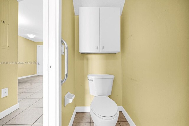 5440NW 107th Ave Unit 204, Doral, FL 33178 - bathroom with tile patterned flooring, baseboards, and toilet