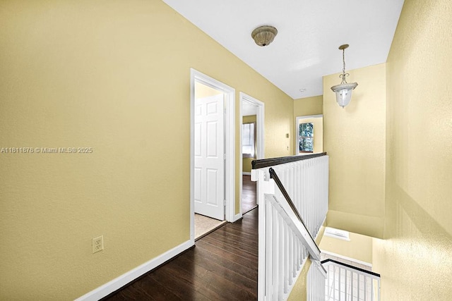 5440NW 107th Ave Unit 204, Doral, FL 33178 - corridor with an upstairs landing, dark wood-style floors, and baseboards