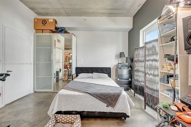 10 SW S River Dr Unit Ph108, Miami, FL 33130 - bedroom with finished concrete flooring