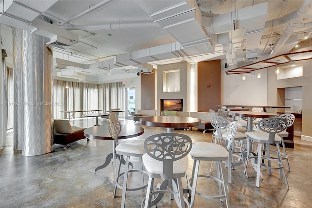 10 SW S River Dr Unit Ph108, Miami, FL 33130 - dining area with finished concrete flooring