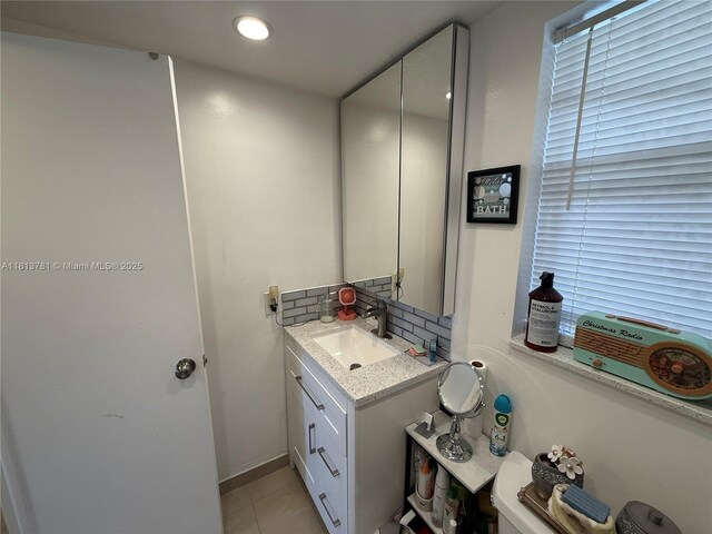 2851 E Sunrise Lakes Dr Unit 205, Sunrise, FL 33322 - half bathroom featuring vanity and tile patterned floors