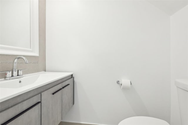 1951 Atlantic Shores Blvd Unit 14, Hallandale Beach, FL 33009 - half bathroom featuring toilet and vanity