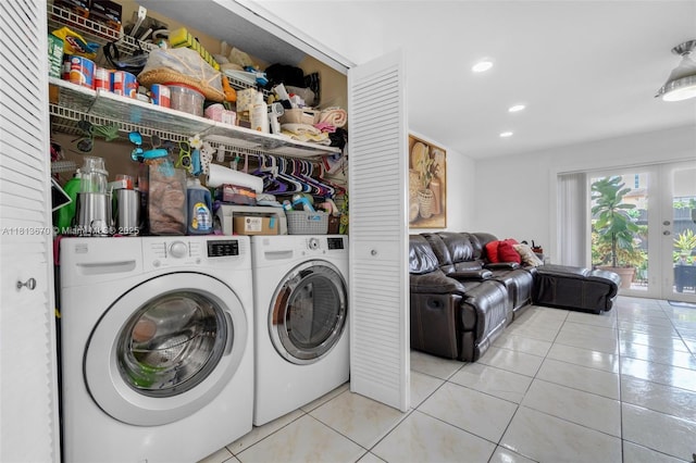 401 SW 109th Ave Unit 26, Sweetwater, FL 33174 - laundry area with light tile patterned floors, washing machine and dryer, french doors, and recessed lighting