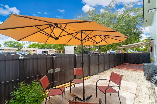 401 SW 109th Ave Unit 26, Sweetwater, FL 33174 - view of patio / terrace with a deck and cooling unit