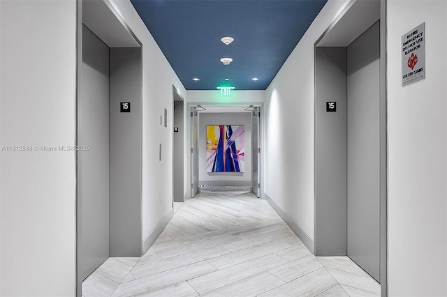 55 SW 9th St Unit 1510, Miami, FL 33130 - hallway featuring elevator, recessed lighting, and light wood finished floors