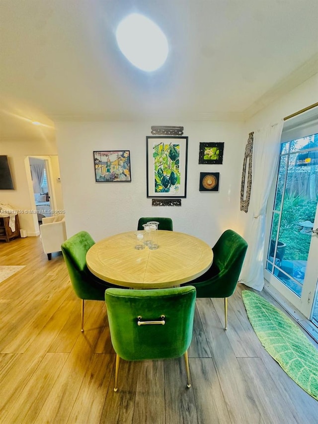 928 NE 18th Ct, Fort Lauderdale, FL 33305 - dining area featuring wood finished floors