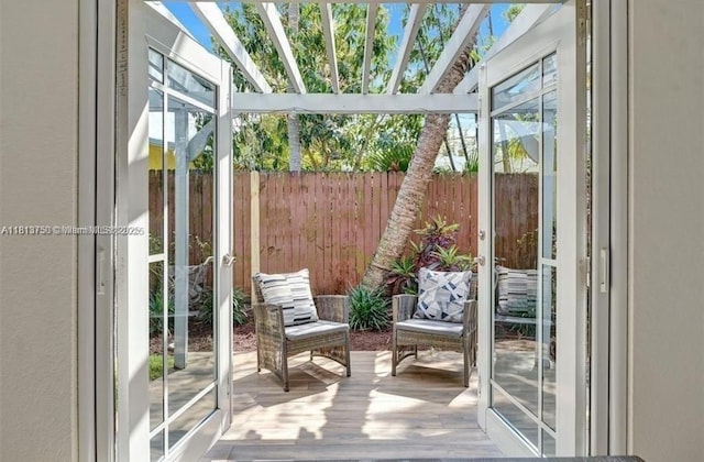 928 NE 18th Ct, Fort Lauderdale, FL 33305 - sunroom featuring french doors and healthy amount of natural light