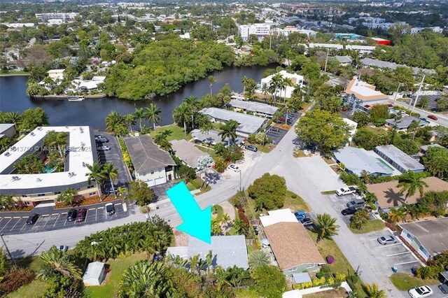 928 NE 18th Ct, Fort Lauderdale, FL 33305 - aerial view of property and surrounding area with a large body of water and a pool area