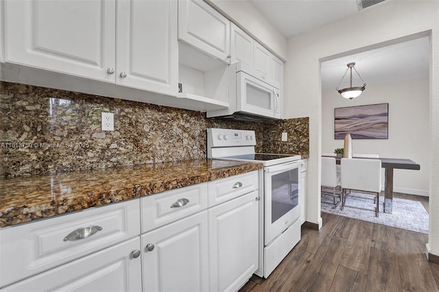 928 NE 18th Ct, Fort Lauderdale, FL 33305 - kitchen with white appliances, white cabinetry, backsplash, dark wood finished floors, and baseboards