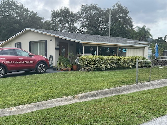 2430 N 61st Ter, Hollywood, FL 33024 - ranch-style house featuring a shingled roof