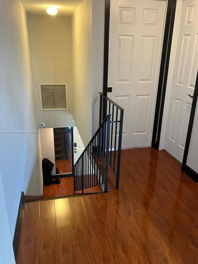 9351 Fontainebleau Blvd Unit B206, Miami, FL 33172 - stairway featuring wood finished floors and baseboards