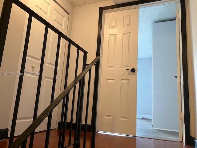 9351 Fontainebleau Blvd Unit B206, Miami, FL 33172 - staircase featuring baseboards