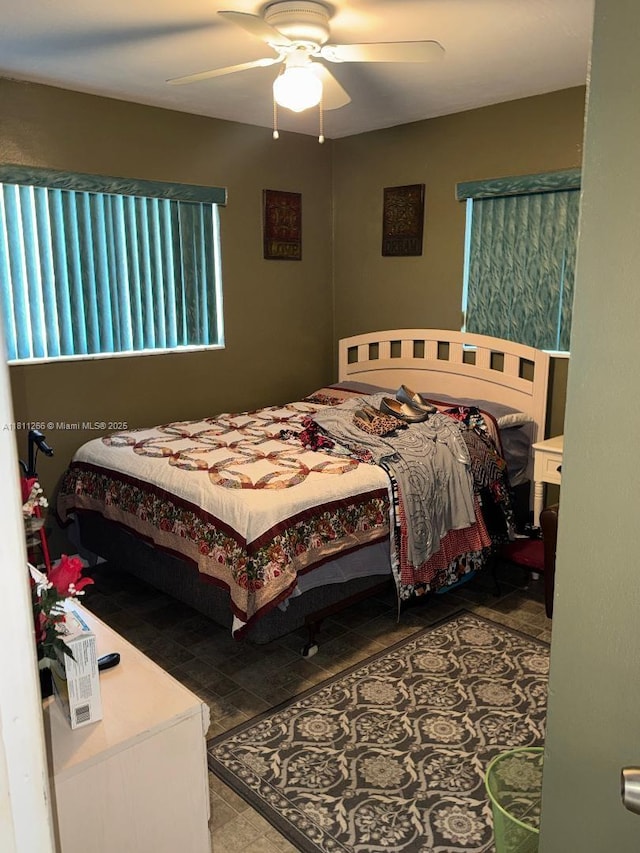 20420 NW 24th Ct, Miami Gardens, FL 33056 - tiled bedroom featuring a ceiling fan