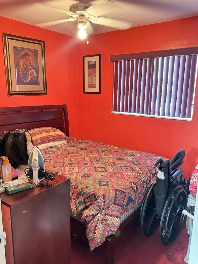 20420 NW 24th Ct, Miami Gardens, FL 33056 - carpeted bedroom featuring a ceiling fan