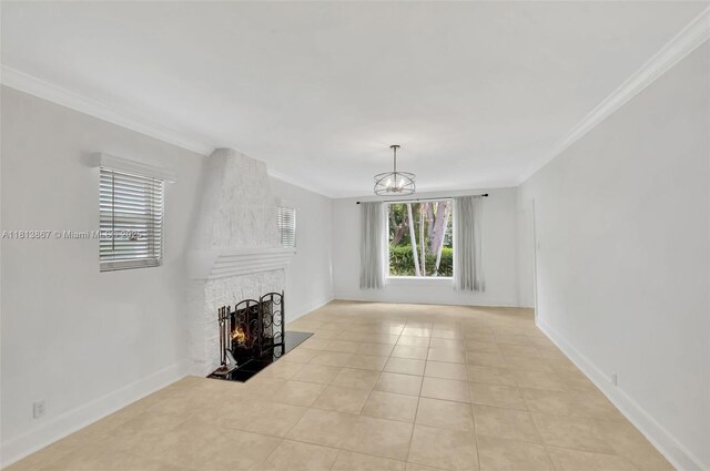 276 NE 90th St, El Portal, FL 33138 - unfurnished living room featuring crown molding, plenty of natural light, a fireplace, light tile patterned flooring, and baseboards
