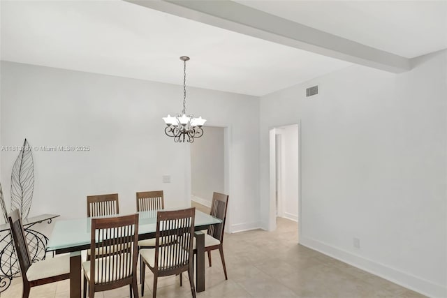 276 NE 90th St, El Portal, FL 33138 - dining room featuring a chandelier, baseboards, and light tile patterned flooring