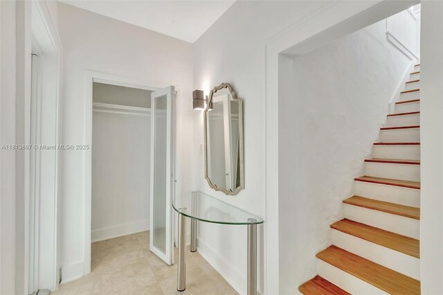 276 NE 90th St, El Portal, FL 33138 - stairway featuring baseboards