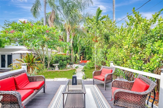 276 NE 90th St, El Portal, FL 33138 - wooden terrace with outdoor lounge area and french doors