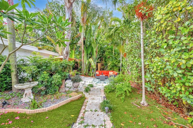 276 NE 90th St, El Portal, FL 33138 - view of yard featuring an outdoor hangout area and a patio area