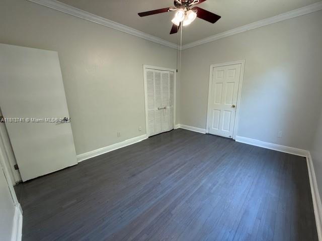 1525 SW 18th St, Miami, FL 33145 - spare room with ceiling fan, dark wood finished floors, and ornamental molding