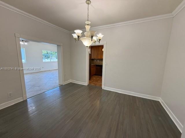 1525 SW 18th St, Miami, FL 33145 - empty room featuring a chandelier, ornamental molding, and dark wood-style floors