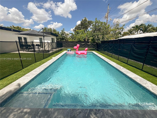 1451 NE 155th Ter, North Miami Beach, FL 33162 - view of swimming pool featuring a patio