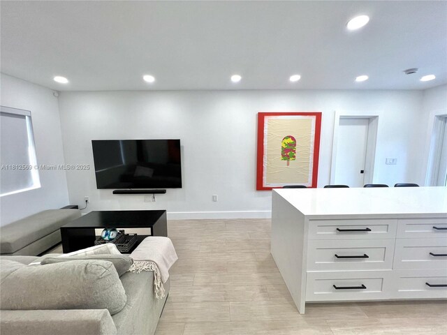 1451 NE 155th Ter, North Miami Beach, FL 33162 - living room featuring recessed lighting, baseboards, and light wood-style floors