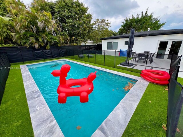 1451 NE 155th Ter, North Miami Beach, FL 33162 - view of swimming pool with a patio and french doors