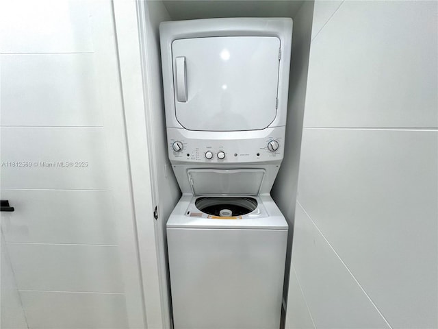 1451 NE 155th Ter, North Miami Beach, FL 33162 - washroom with stacked washer / dryer
