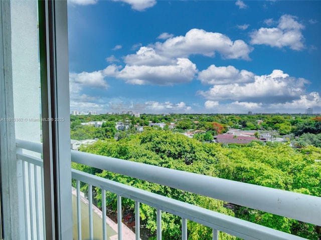 3000 Coral Way Unit 715, Miami, FL 33145 - balcony featuring view of wooded area