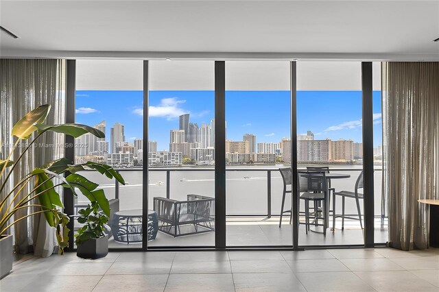 5000 Island Estates Dr Unit 702, Aventura, FL 33160 - sunroom featuring a skyline view