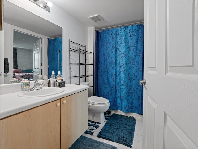 3000 Coral Way Unit 815, Miami, FL 33145 - bathroom with vanity, tile patterned floors, and a shower with curtain