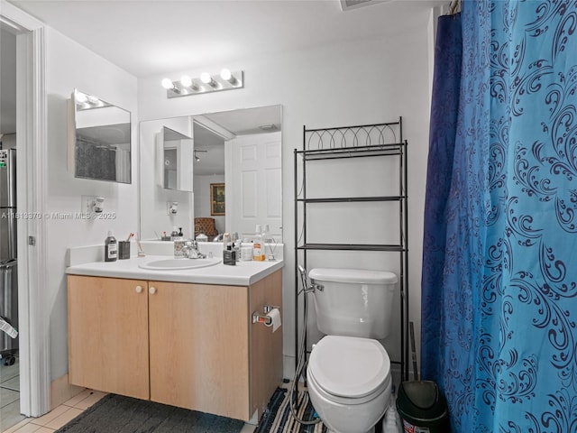 3000 Coral Way Unit 815, Miami, FL 33145 - bathroom with vanity, tile patterned floors, and a shower with curtain