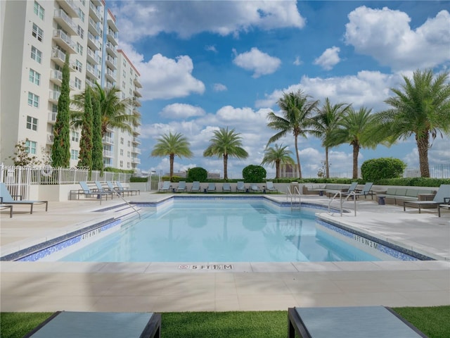 3000 Coral Way Unit 815, Miami, FL 33145 - community pool featuring a patio