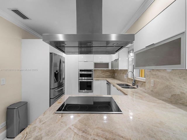 1715 SW 102nd Ct, Miami, FL 33165 - kitchen with appliances with stainless steel finishes, a sink, island exhaust hood, white cabinets, and light stone counters