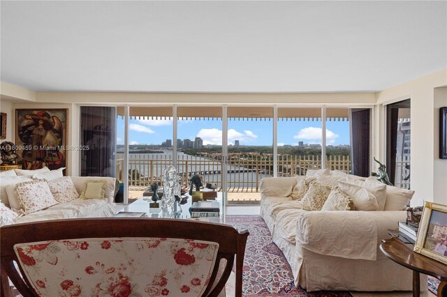 3 Grove Isle Dr Unit C1610, Miami, FL 33133 - living room featuring a water view and plenty of natural light