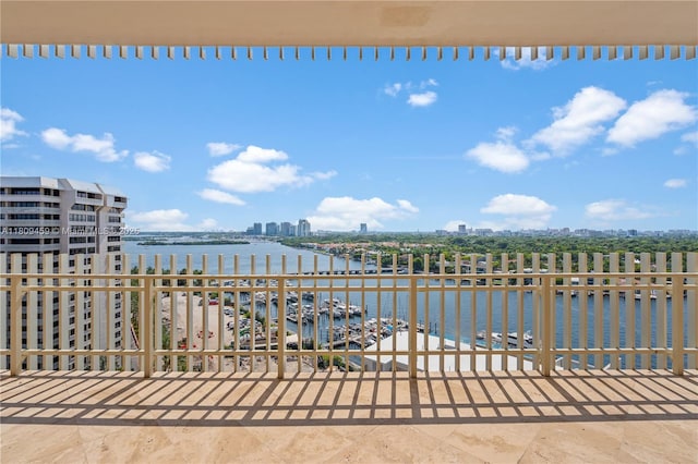 3 Grove Isle Dr Unit C1610, Miami, FL 33133 - view of patio / terrace with a water view and a city view