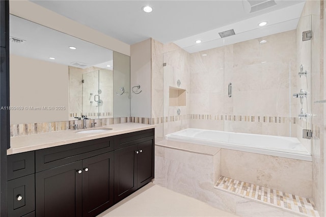 3 Grove Isle Dr Unit C1610, Miami, FL 33133 - full bath featuring vanity, recessed lighting, and tiled shower / bath combo