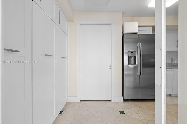 3 Grove Isle Dr Unit C1610, Miami, FL 33133 - kitchen with stainless steel fridge, white cabinetry, dishwasher, and light tile patterned floors