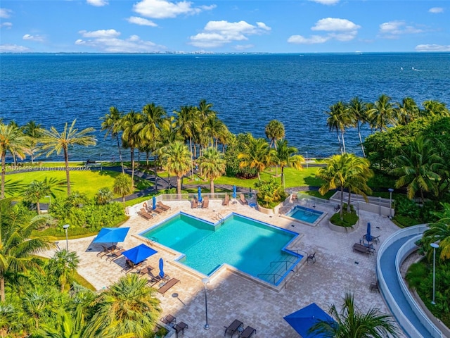 3 Grove Isle Dr Unit C1610, Miami, FL 33133 - community pool with a water view, a patio area, and a community hot tub