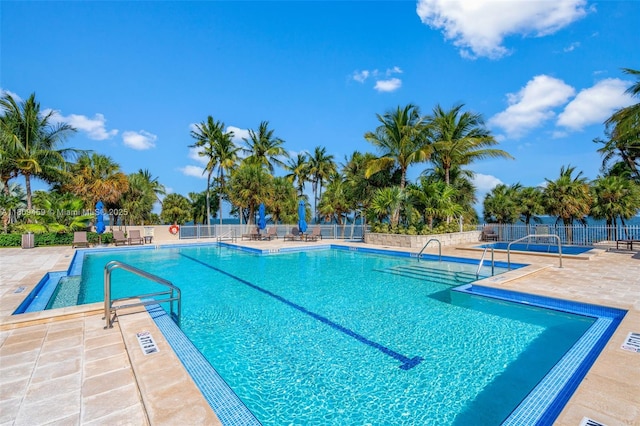 3 Grove Isle Dr Unit C1610, Miami, FL 33133 - community pool with a patio area
