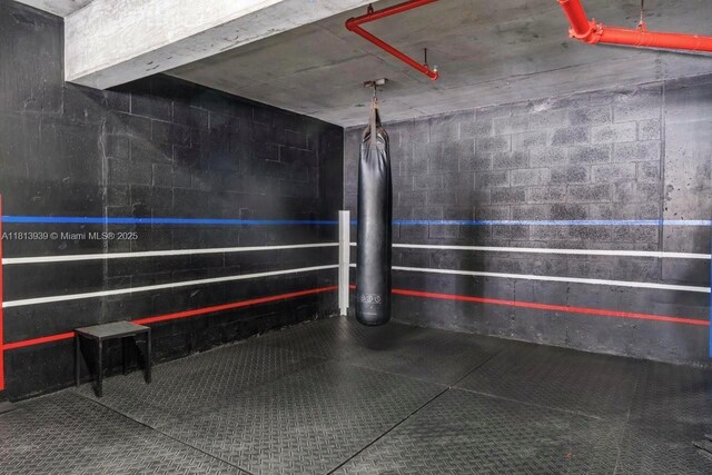690 SW 1st Ct Unit 1006, Miami, FL 33130 - garage featuring concrete block wall