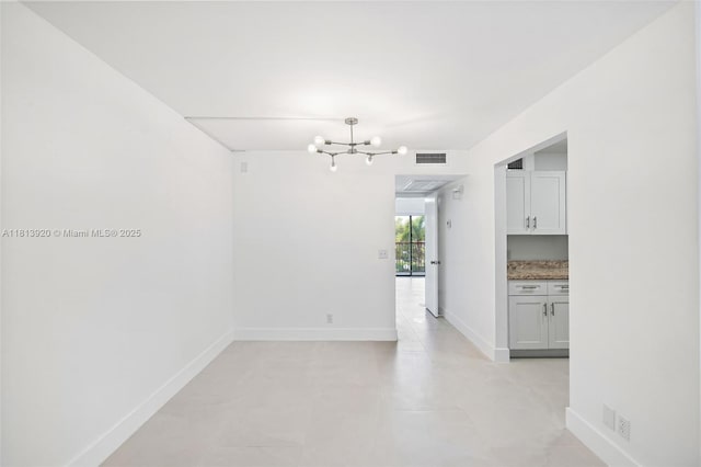 13455 SW 9th Ct Unit 315J, Pembroke Pines, FL 33027 - unfurnished dining area featuring a chandelier and baseboards