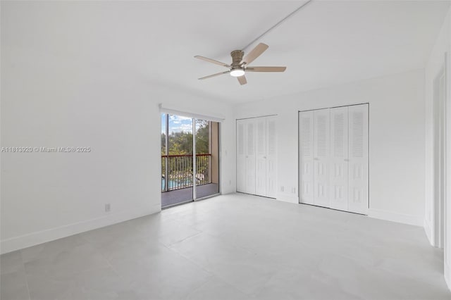 13455 SW 9th Ct Unit 315J, Pembroke Pines, FL 33027 - unfurnished bedroom featuring access to outside, multiple closets, ceiling fan, and baseboards
