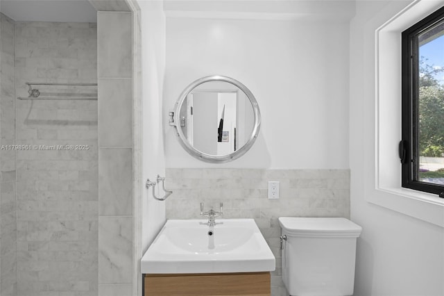 1060 NE 95th St, Miami Shores, FL 33138 - full bathroom with vanity, a tile shower, and tile walls