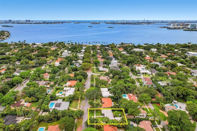 1060 NE 95th St, Miami Shores, FL 33138 - aerial view of residential area with property boundaries highlighted and a nearby body of water