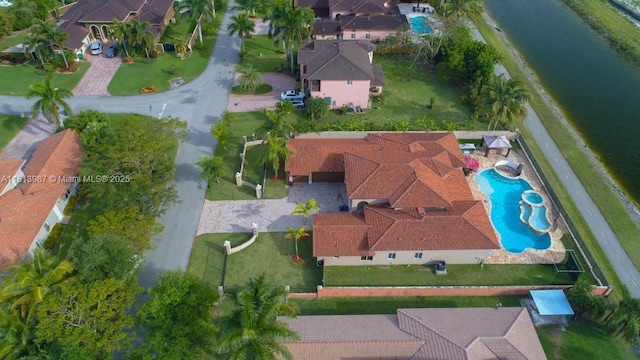 19686 SW 130th Ave Rd, Miami, FL 33177 - aerial view of property and surrounding area featuring a pool, a large body of water, and nearby suburban area