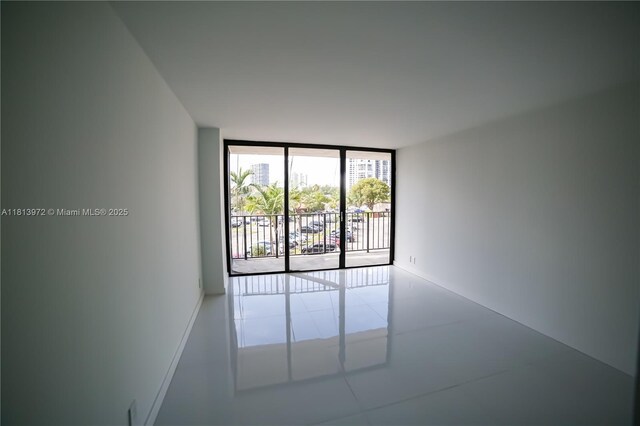 200 Leslie Dr Unit 314, Hallandale Beach, FL 33009 - spare room with expansive windows