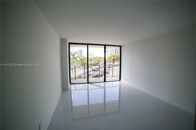 200 Leslie Dr Unit 314, Hallandale Beach, FL 33009 - spare room with expansive windows