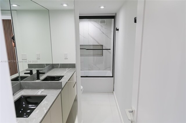 200 Leslie Dr Unit 314, Hallandale Beach, FL 33009 - full bathroom featuring toilet, double vanity, shower / bath combination, and recessed lighting